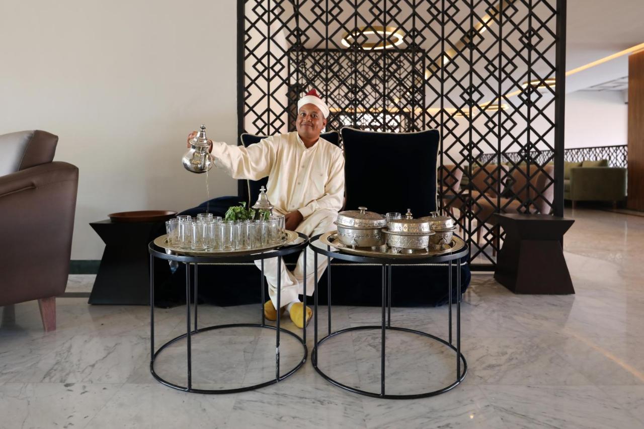 Kenzi Rose Garden Hotel Marrakesh Exterior photo A Moroccan tea ceremony
