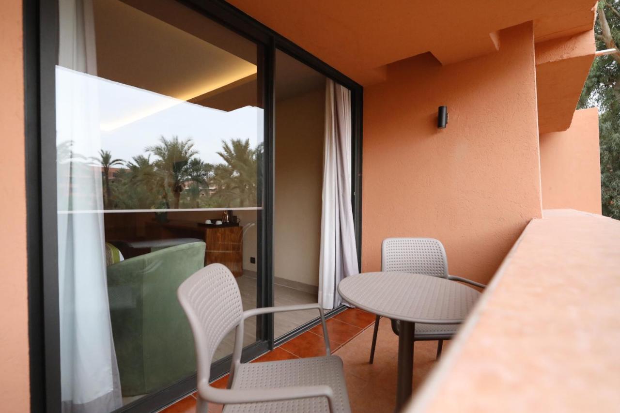 Kenzi Rose Garden Hotel Marrakesh Exterior photo A balcony at the hotel