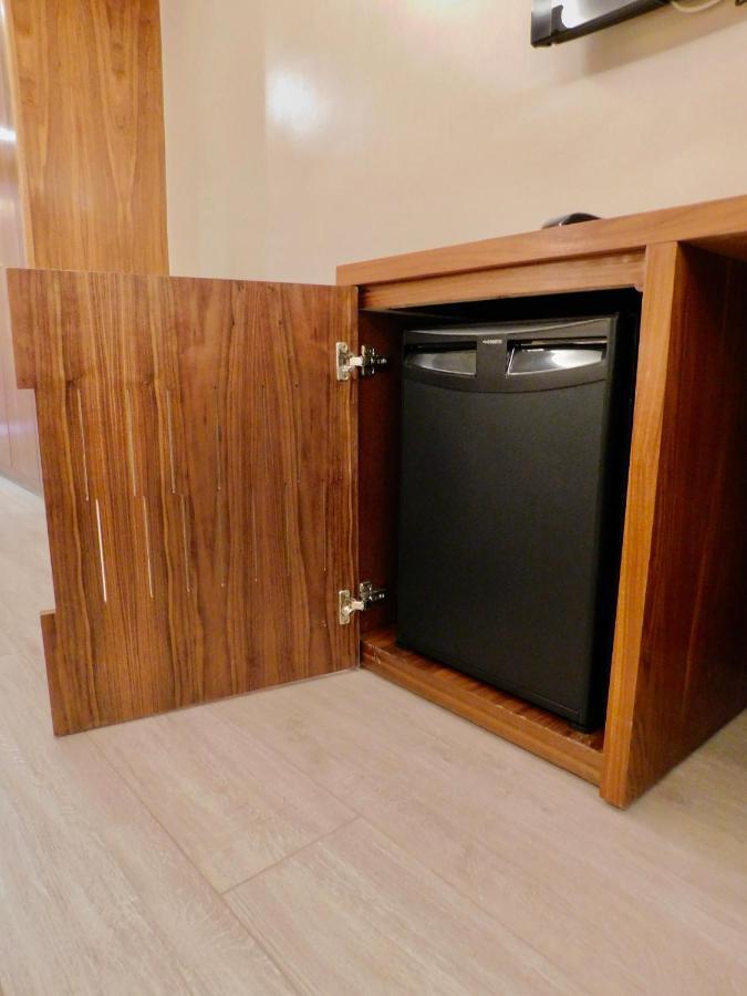 Kenzi Rose Garden Hotel Marrakesh Exterior photo A dishwasher in a cabinet