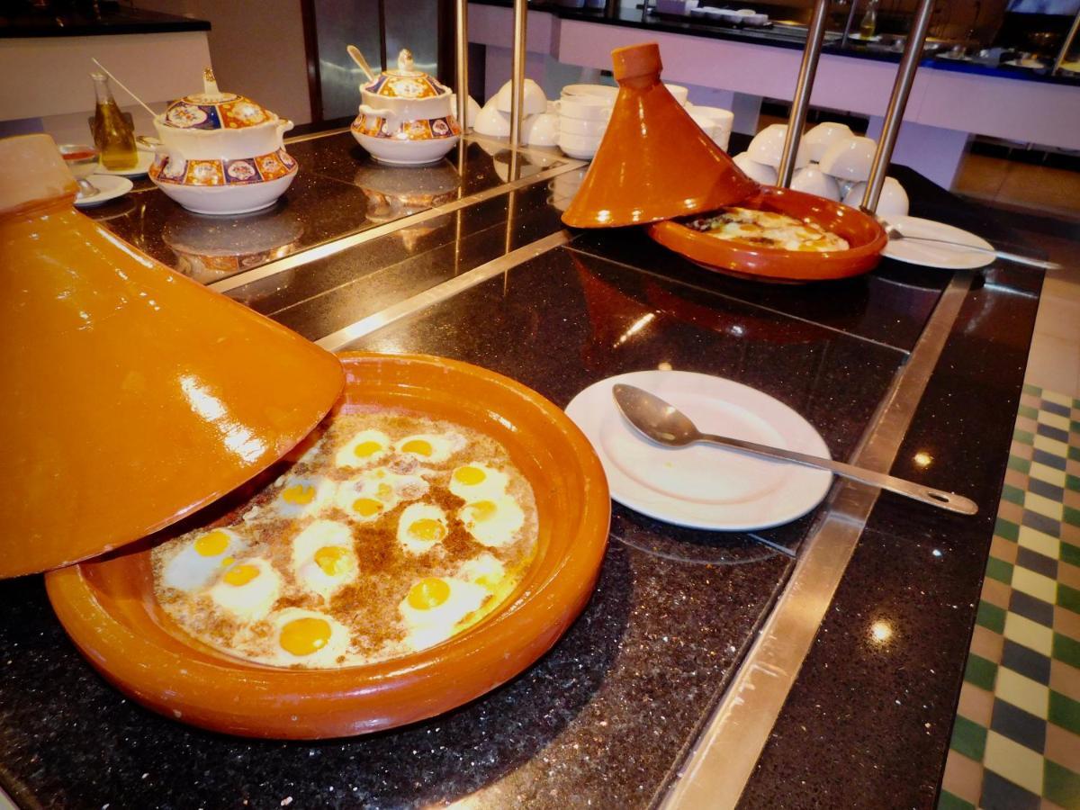 Kenzi Rose Garden Hotel Marrakesh Exterior photo Couscous with seafood