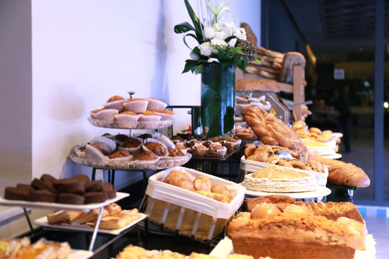 Kenzi Rose Garden Hotel Marrakesh Exterior photo A selection of pastries