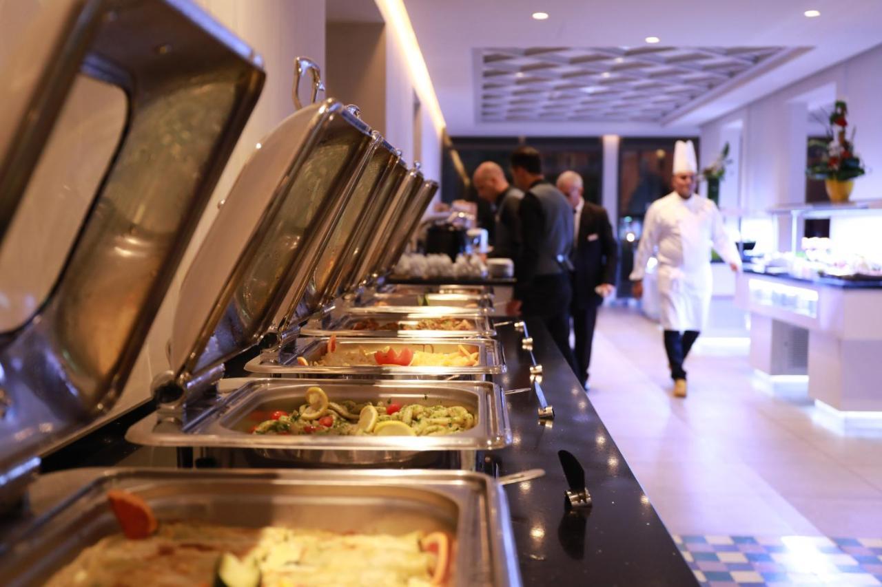 Kenzi Rose Garden Hotel Marrakesh Exterior photo A buffet at a hotel