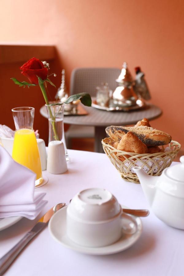 Kenzi Rose Garden Hotel Marrakesh Exterior photo A breakfast table